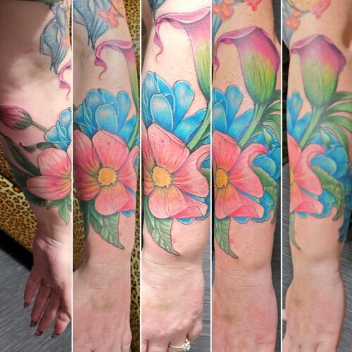 Tattoos by Tymm Cre8tions - womans floral sleeve tattoo