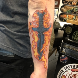 Dylan Llewellyn Tattoos -skateboard arm