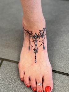 Dylan Llewellyn Tattoos - foot tattoo