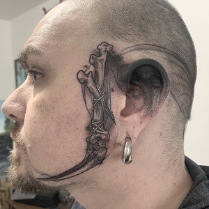 Katina Scheffler Tattoos - scythe face tattoo