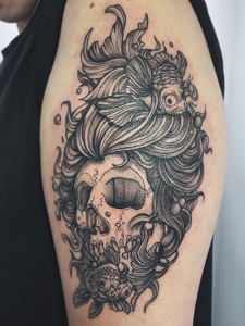 Paul Nye's Tattoo's-skull and fish