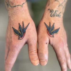 Dylan Llewellyn Tattoos -sparrow hand tattoo